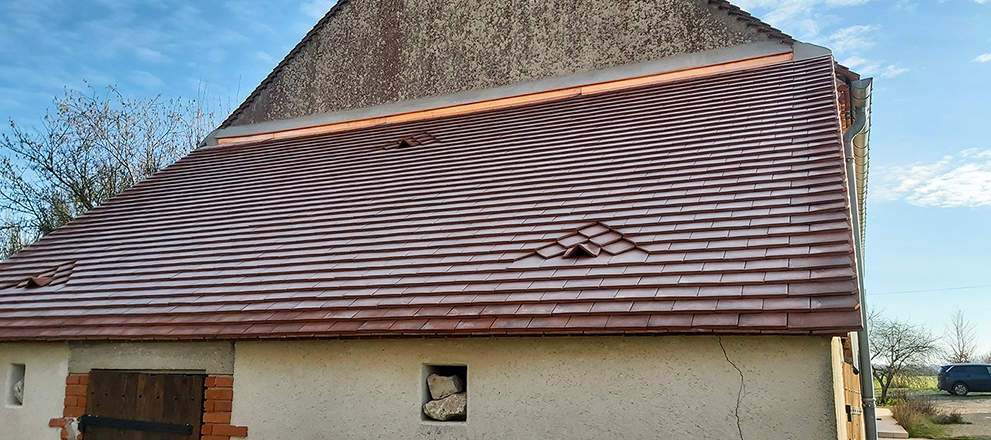 Toiture après rénovation par FR COUVERTURE - Résultat professionnel réparation toiture Lot